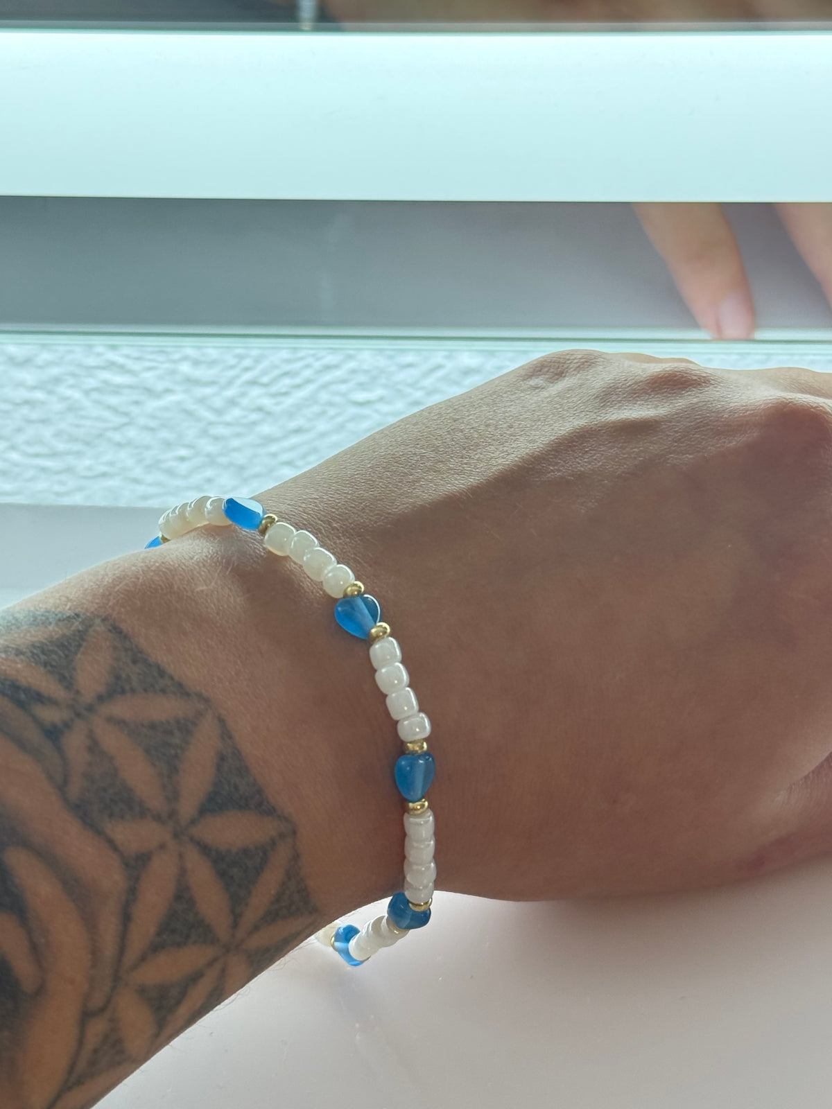 Perlenarmband Herz