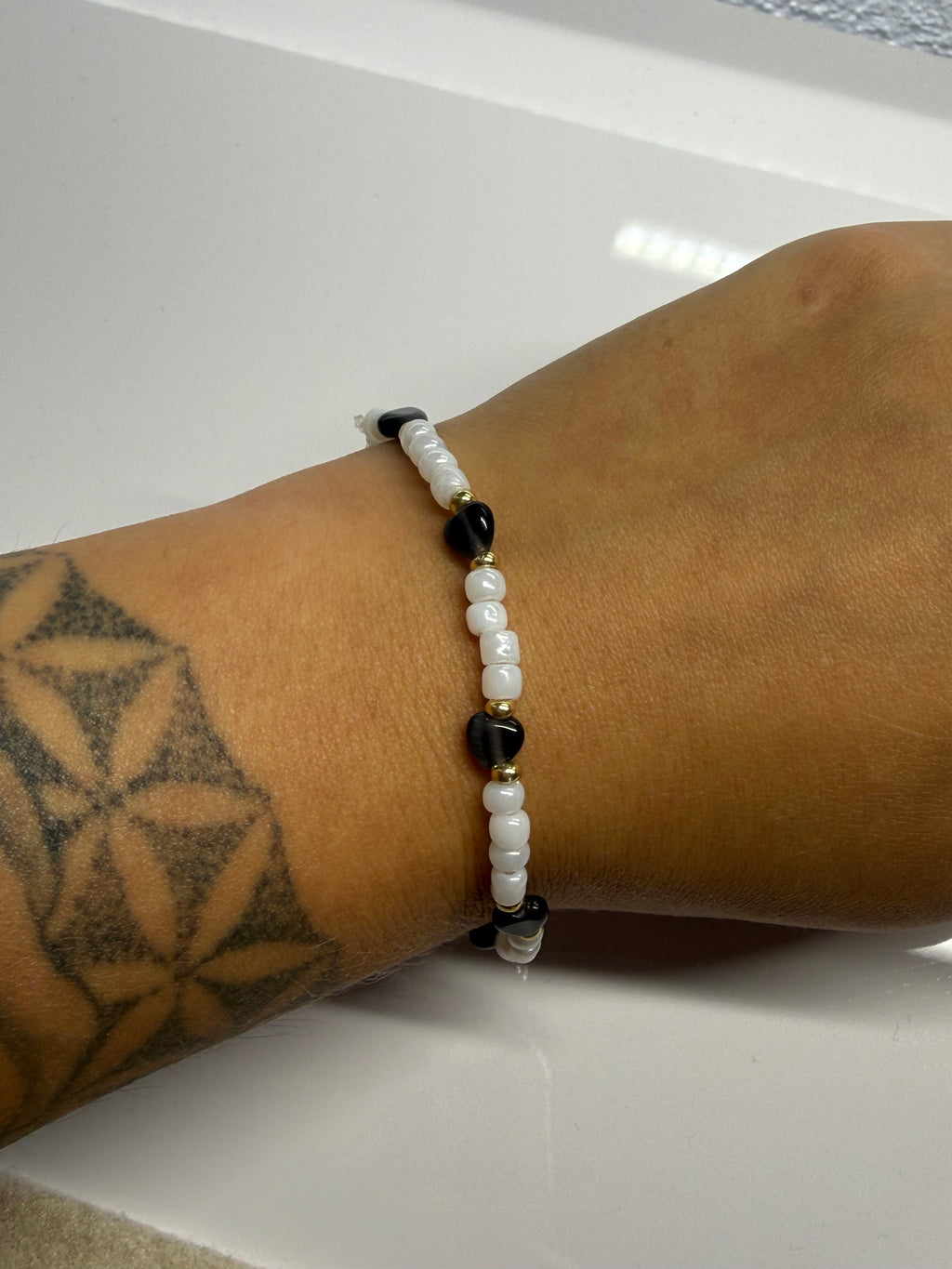 Perlenarmband Herz