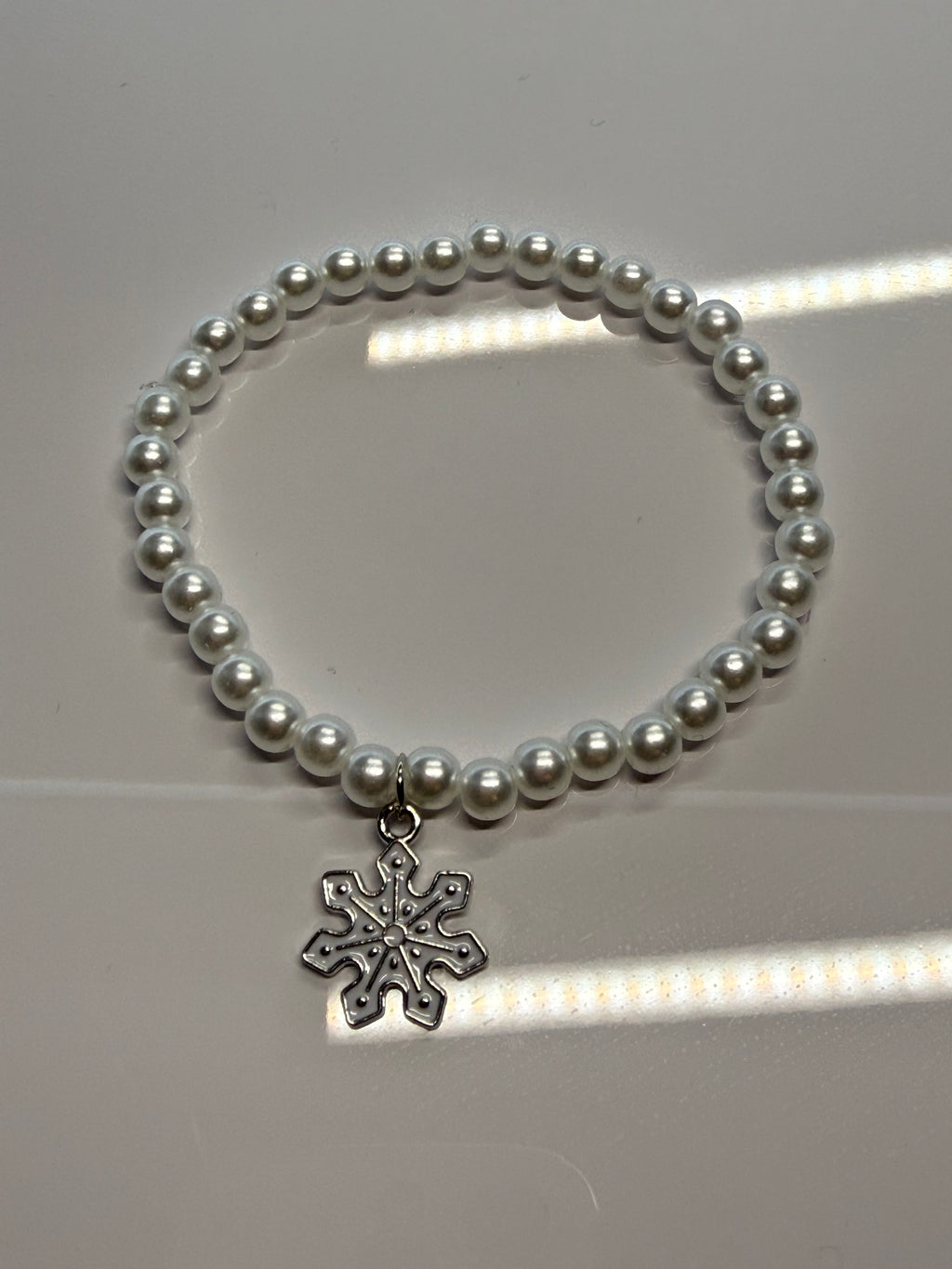Perlenarmband Flöckchen