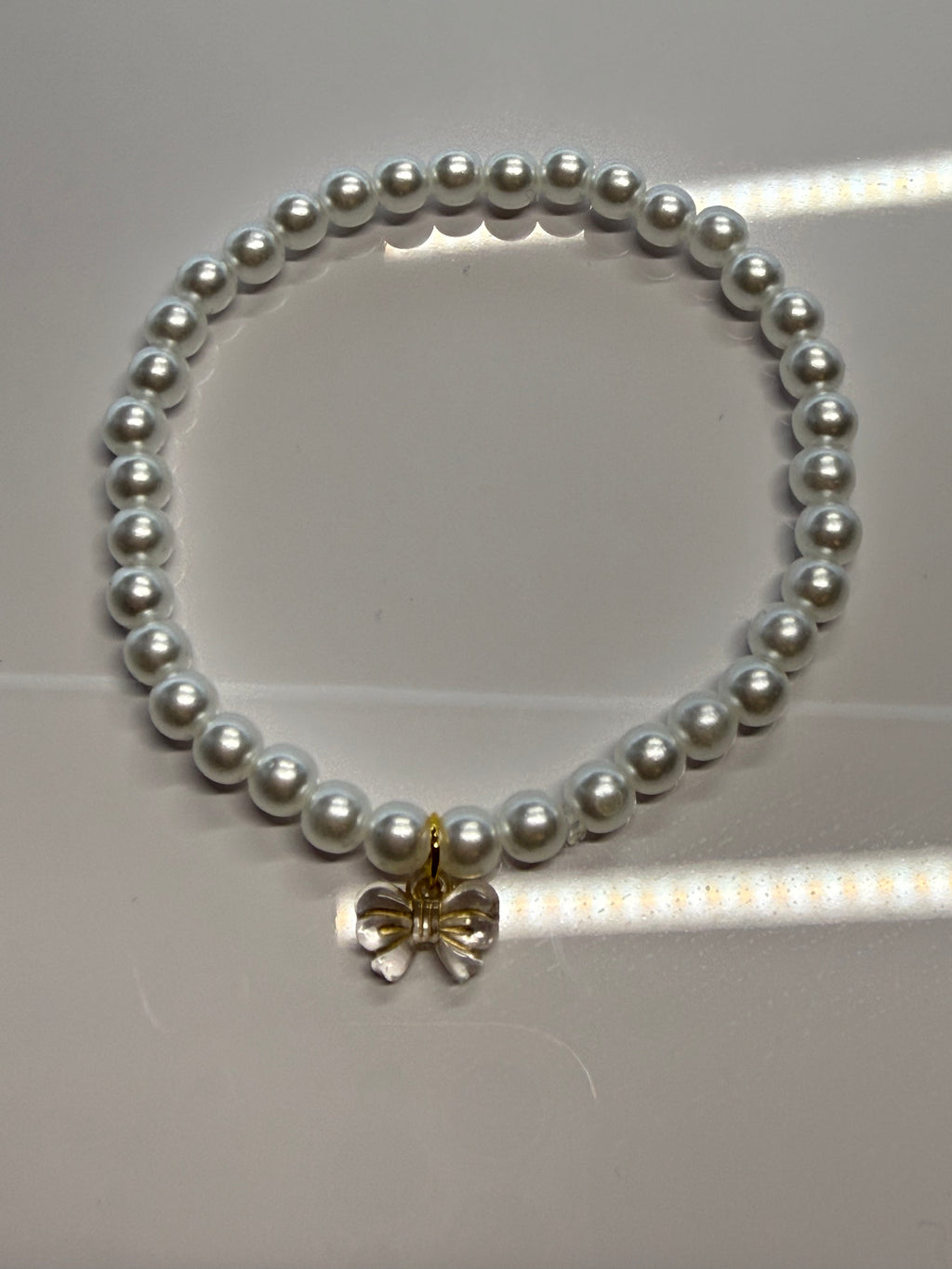 Perlenarmbanf Schleifchen