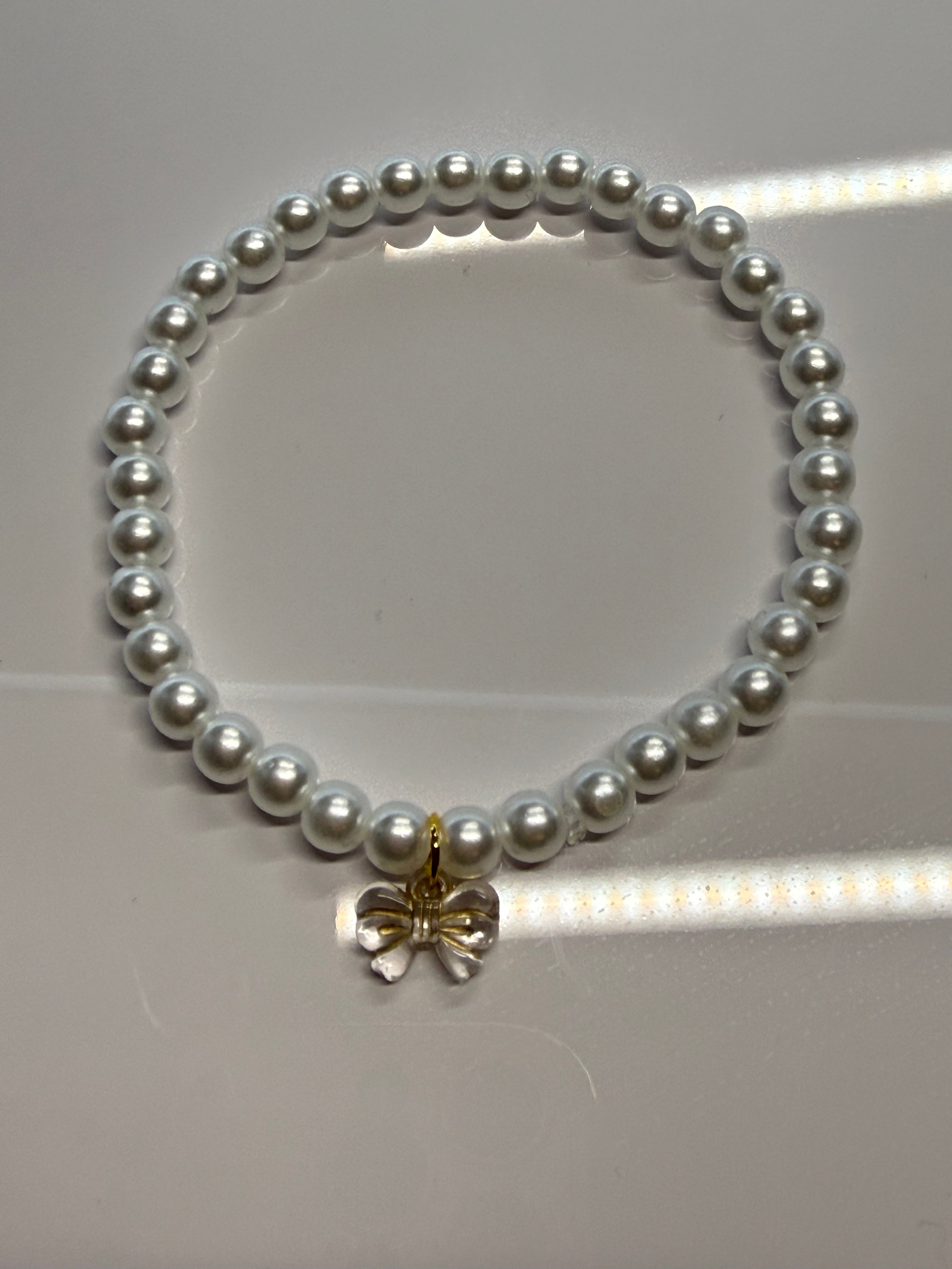 Perlenarmbanf Schleifchen